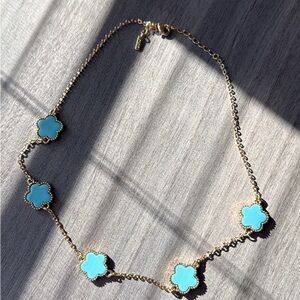 Aldo Gold Necklace with Blue Floral Accents